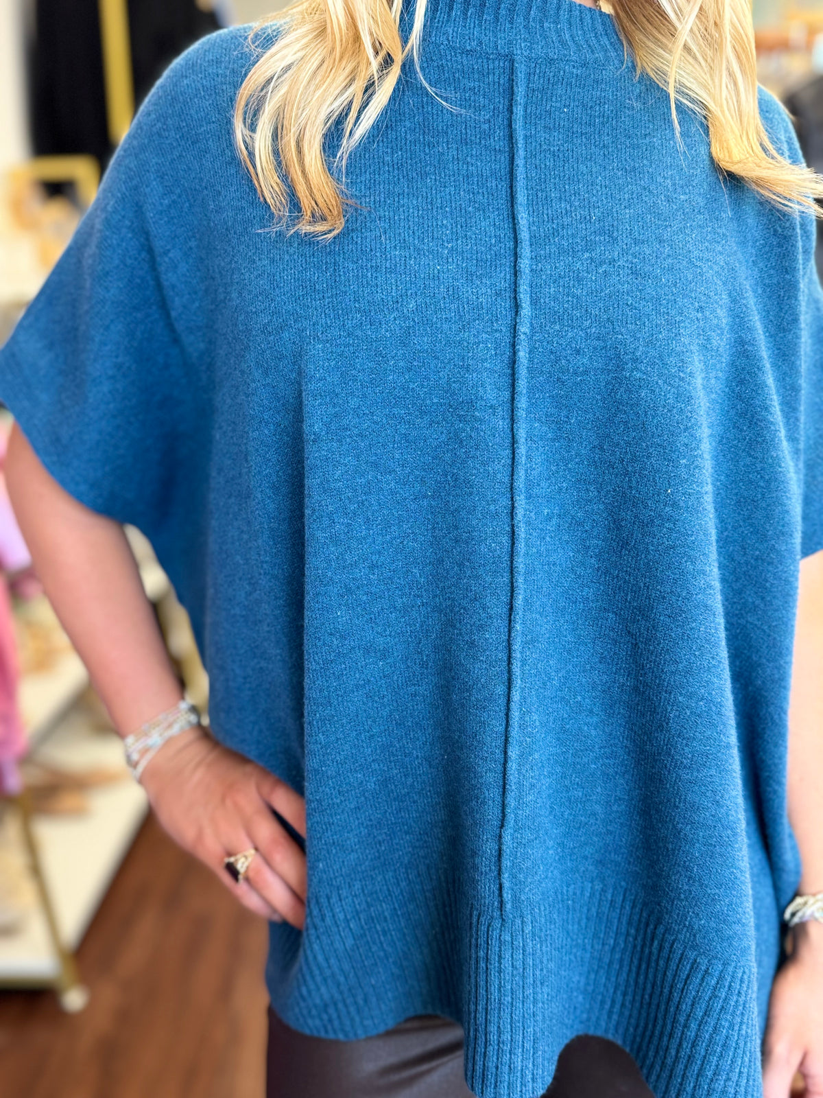 Mosaic teal sweater top side view