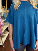 Mosaic teal sweater top center seam detail