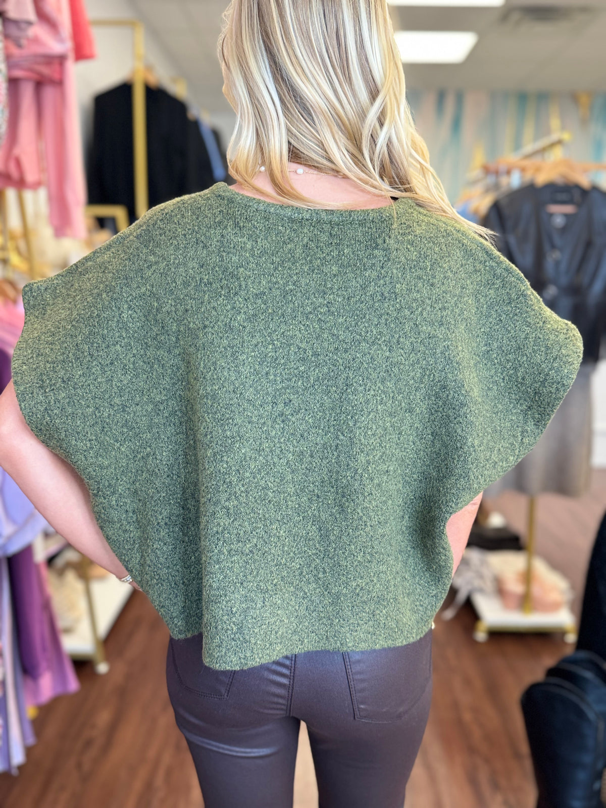 Olive jade marled knit texture close-up