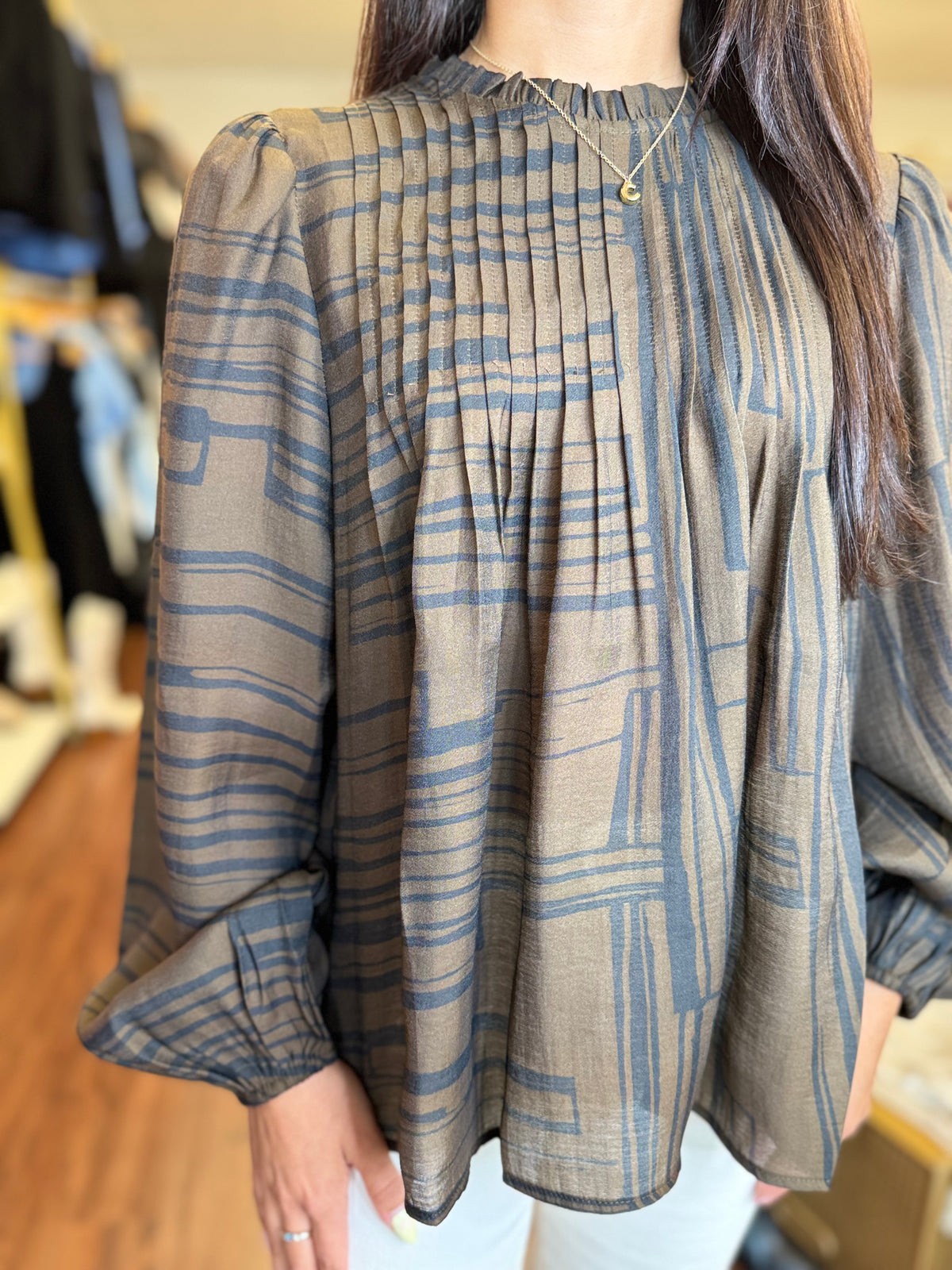 Plaid pleated top button back detail
