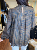 THML plaid pleated top styled at Adore Boutique