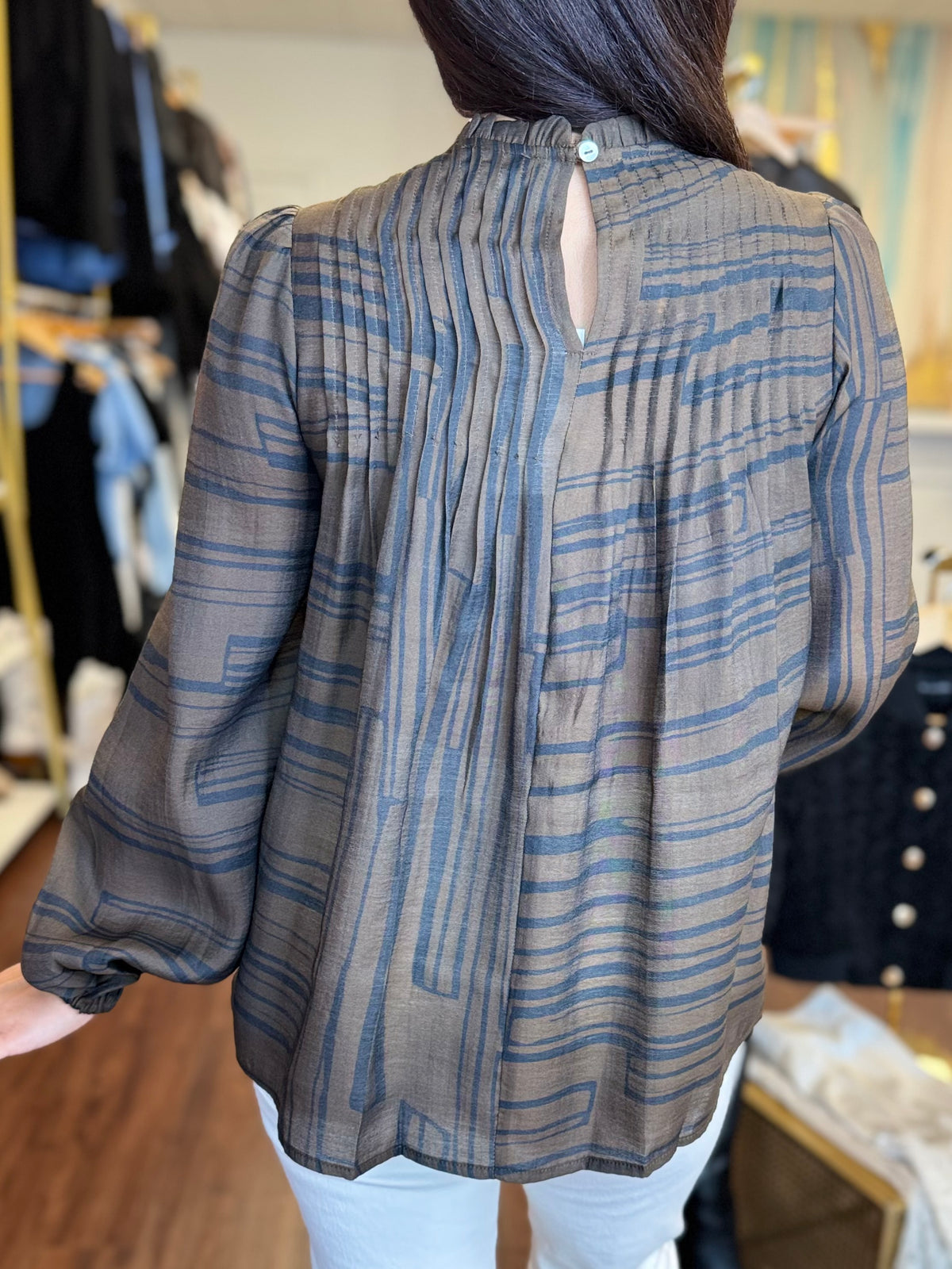 THML plaid pleated top styled at Adore Boutique