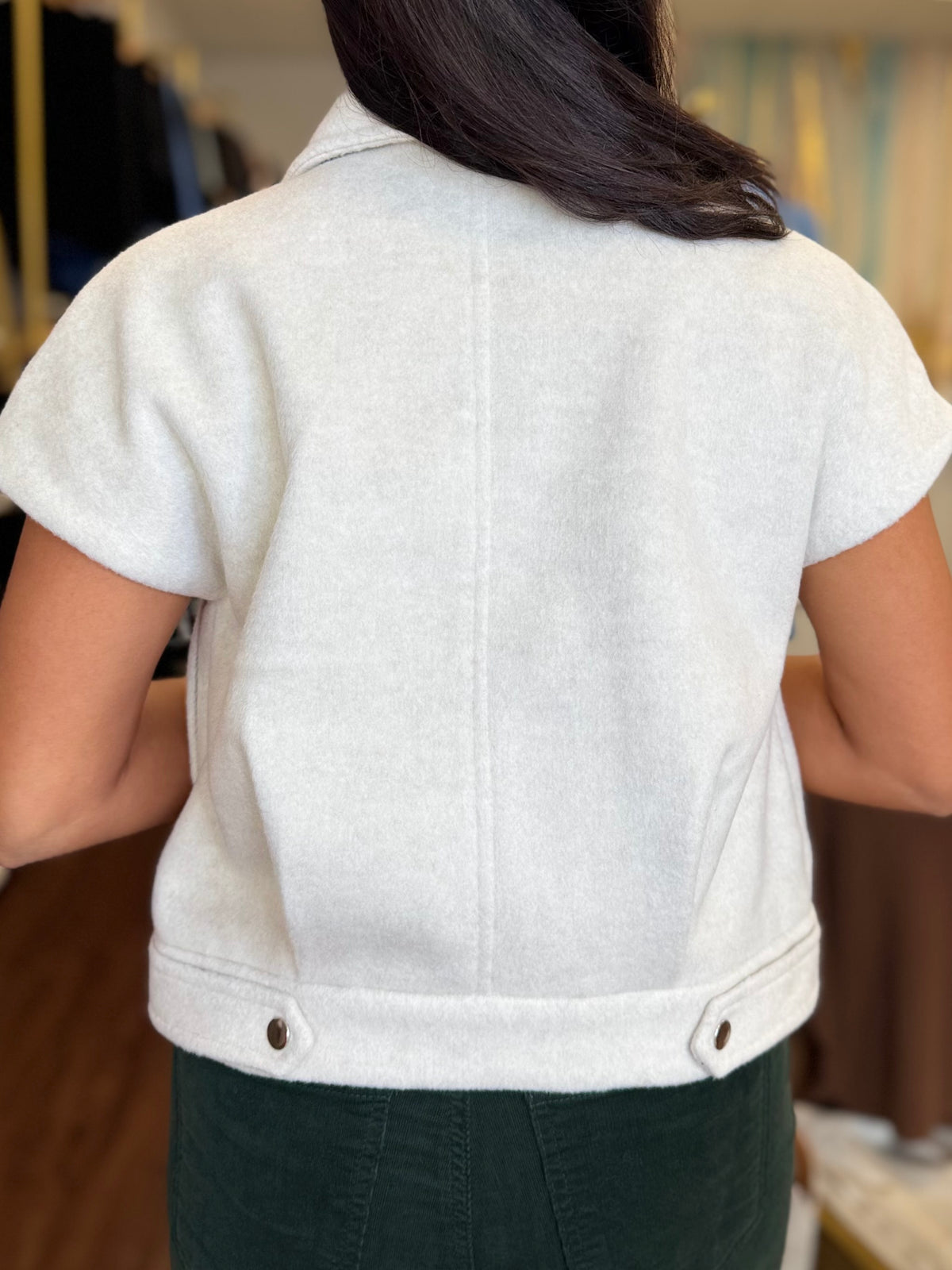 Oatmeal vest jacket styled at Adore Boutique