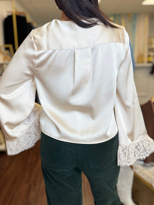 Cream lace trim blouse styled at Adore Boutique