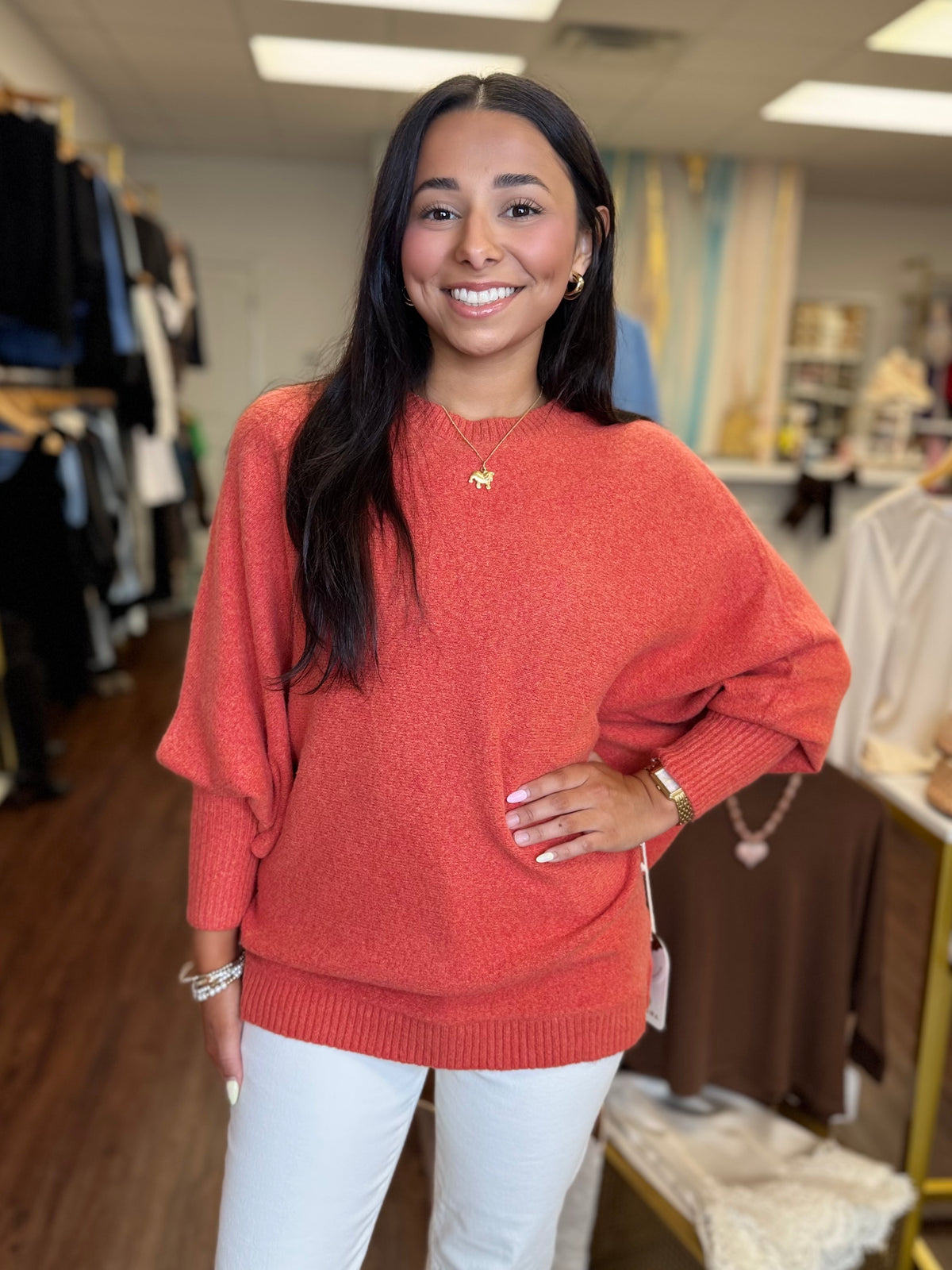 Orange glow dolman sleeve fitted cuff detail