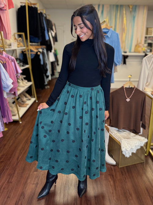 Teal polka dot midi skirt side view