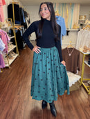 Teal polka dot swing midi skirt front view