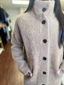 Tan long sweater jacket side view