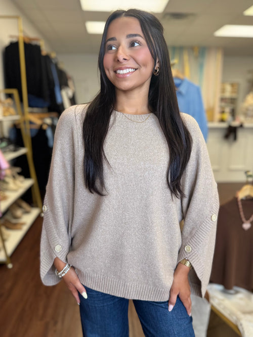 Warm wheat petal sleeve sweater tucked into pants