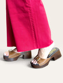 Matisse Miramar platform sandal in tan cow hair with wide buckle strap and sculpted wooden heel