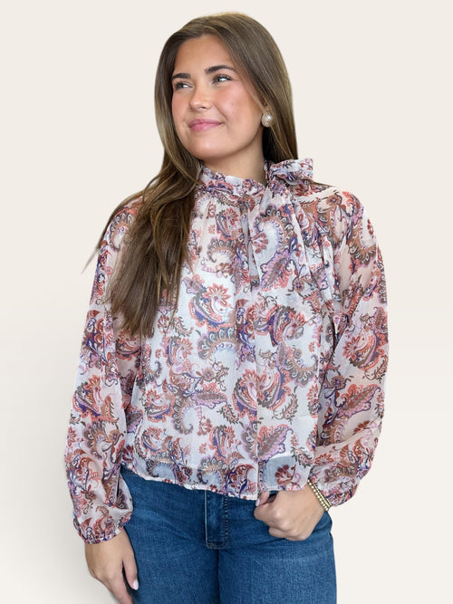 Dusty pink paisley print blouse with high neckline self-tie bow and voluminous raglan sleeves